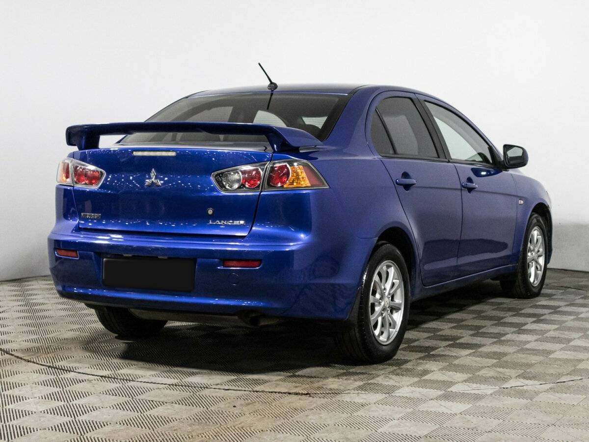 Mitsubishi Lancer с пробегом — 2010 год. Фото: #4