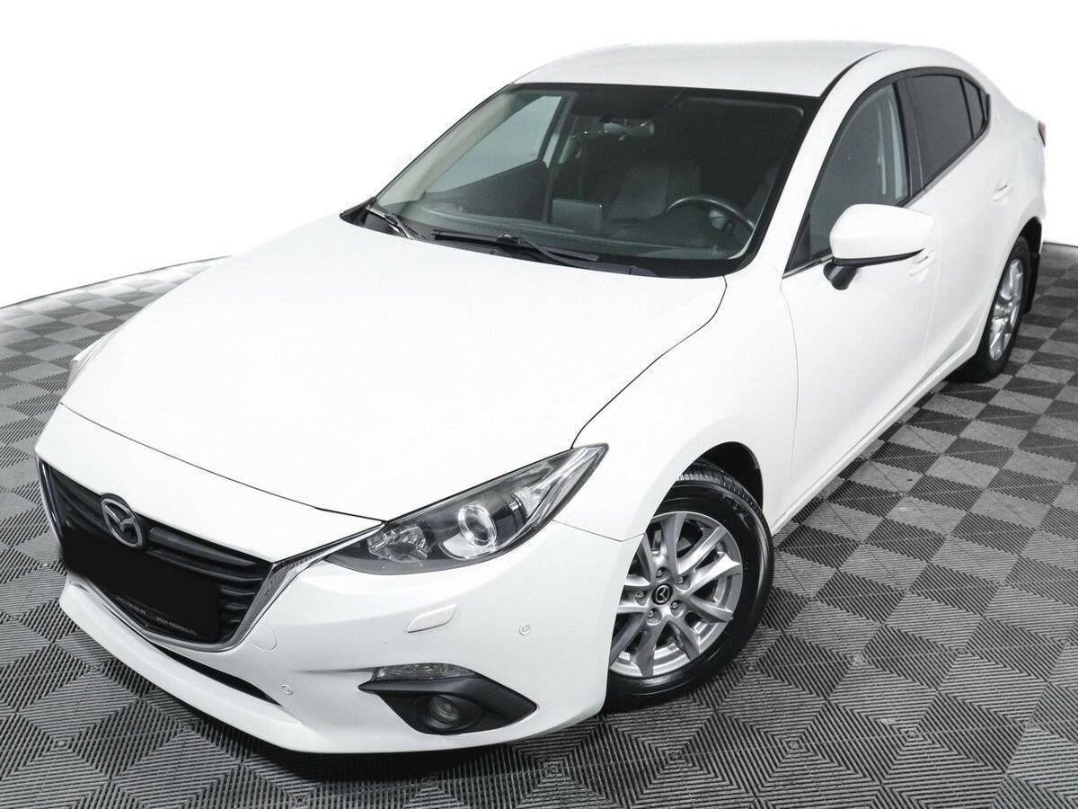 Mazda 3 с пробегом — 2016 год. Фото: #15