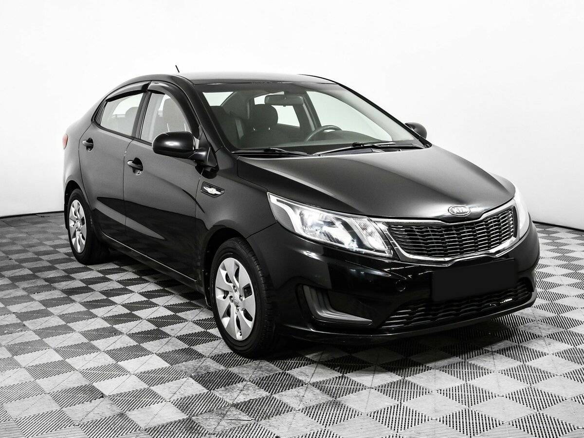 Kia Rio с пробегом — 2011 год. Фото: #2