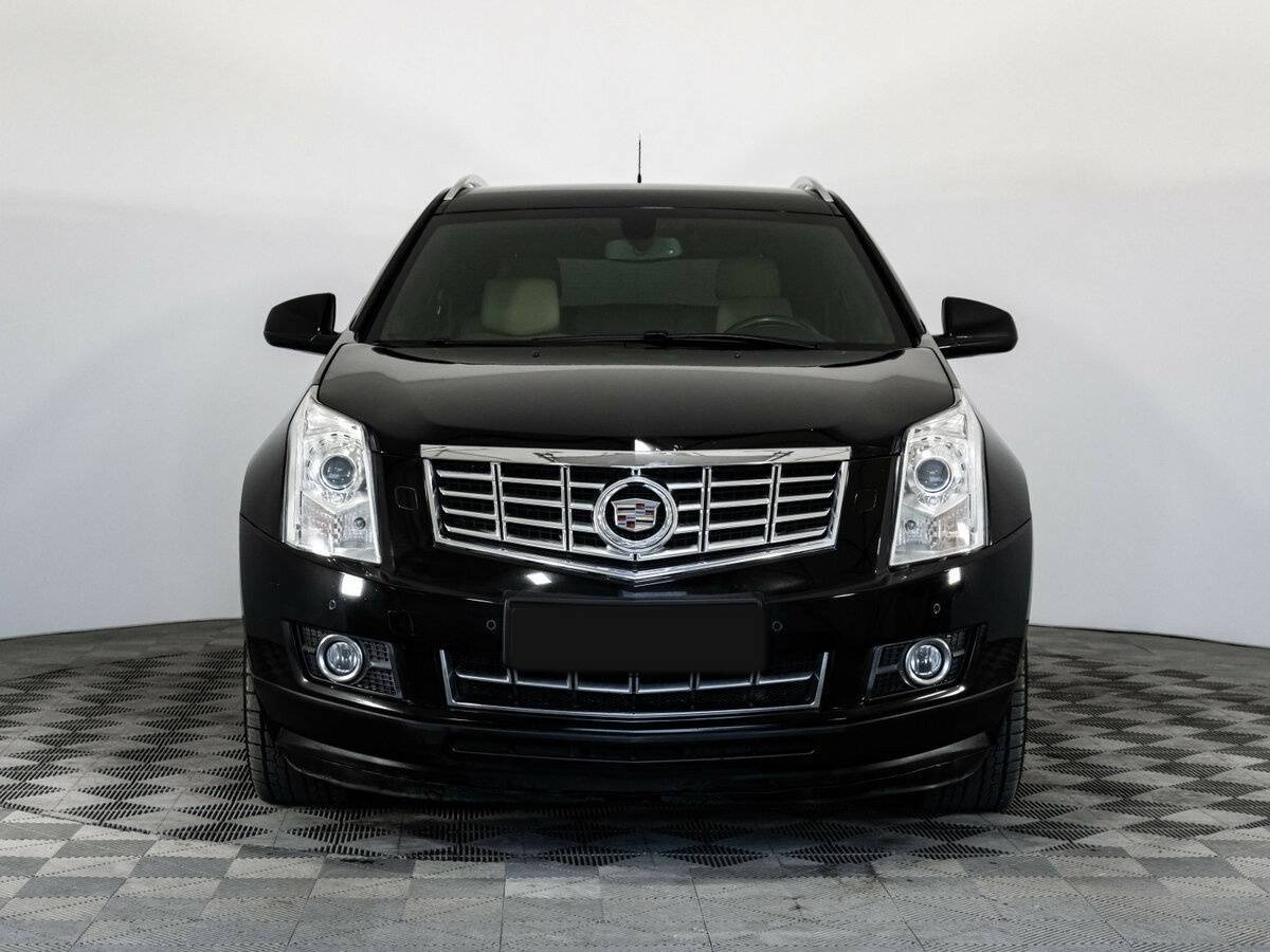 Cadillac SRX с пробегом — 2014 год. Фото: #1