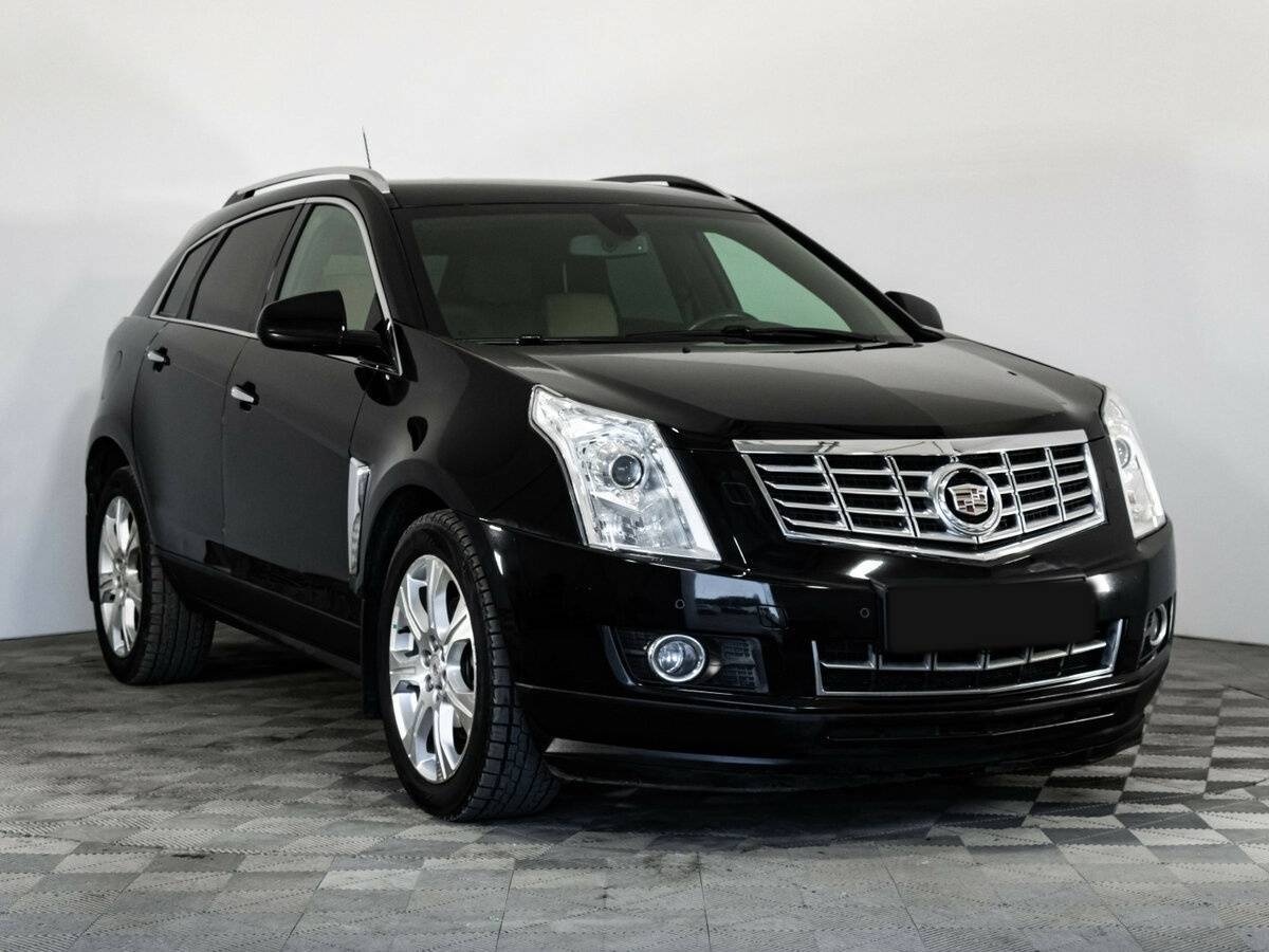 Cadillac SRX с пробегом — 2014 год. Фото: #2