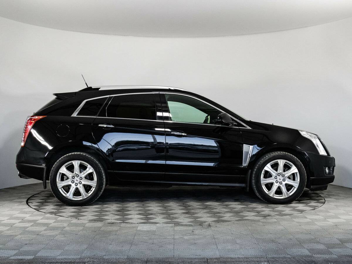 Cadillac SRX с пробегом — 2014 год. Фото: #3