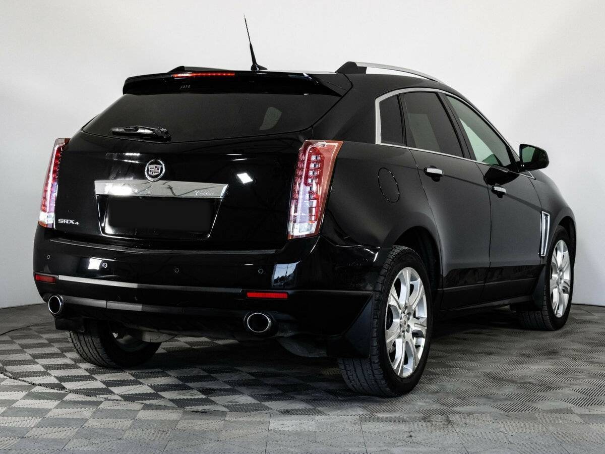 Cadillac SRX с пробегом — 2014 год. Фото: #4