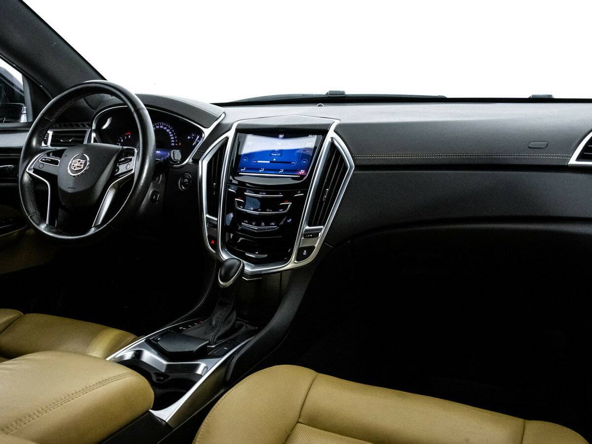 Cadillac SRX с пробегом — 2014 год. Фото: #8