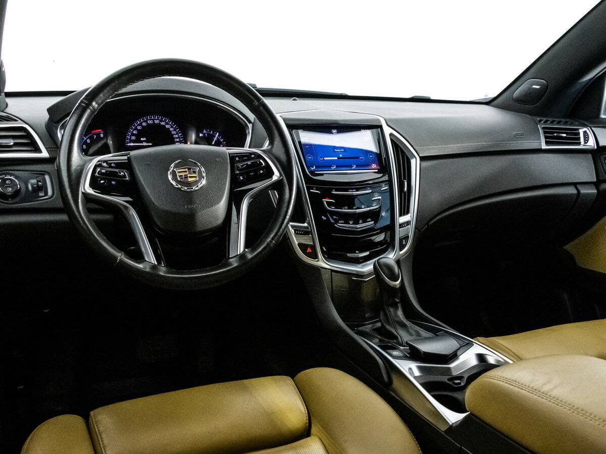 Cadillac SRX с пробегом — 2014 год. Фото: #10