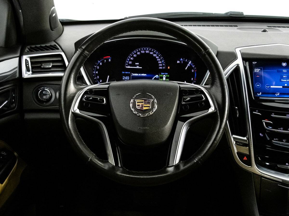 Cadillac SRX с пробегом — 2014 год. Фото: #11