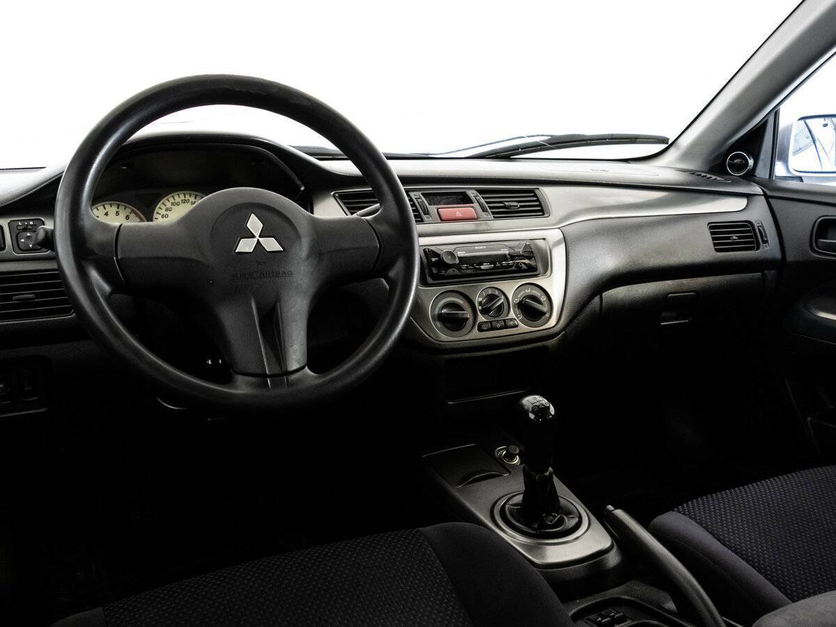 Mitsubishi Lancer с пробегом — 2006 год. Фото: #9