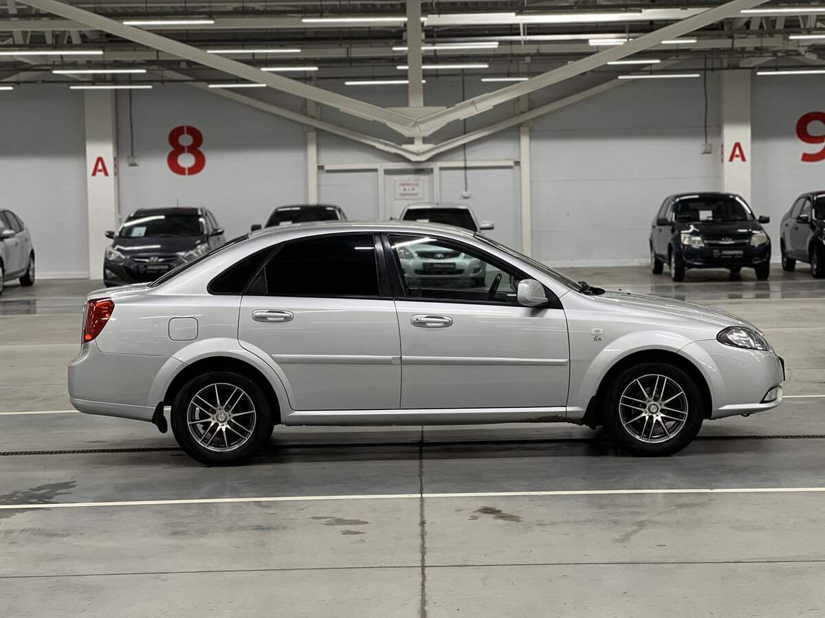 Daewoo Gentra с пробегом — 2013 год. Фото: #3