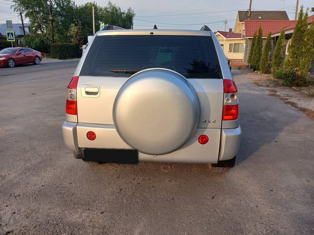 Chery Tiggo (T11) с пробегом — 2013 год. Фото: #4