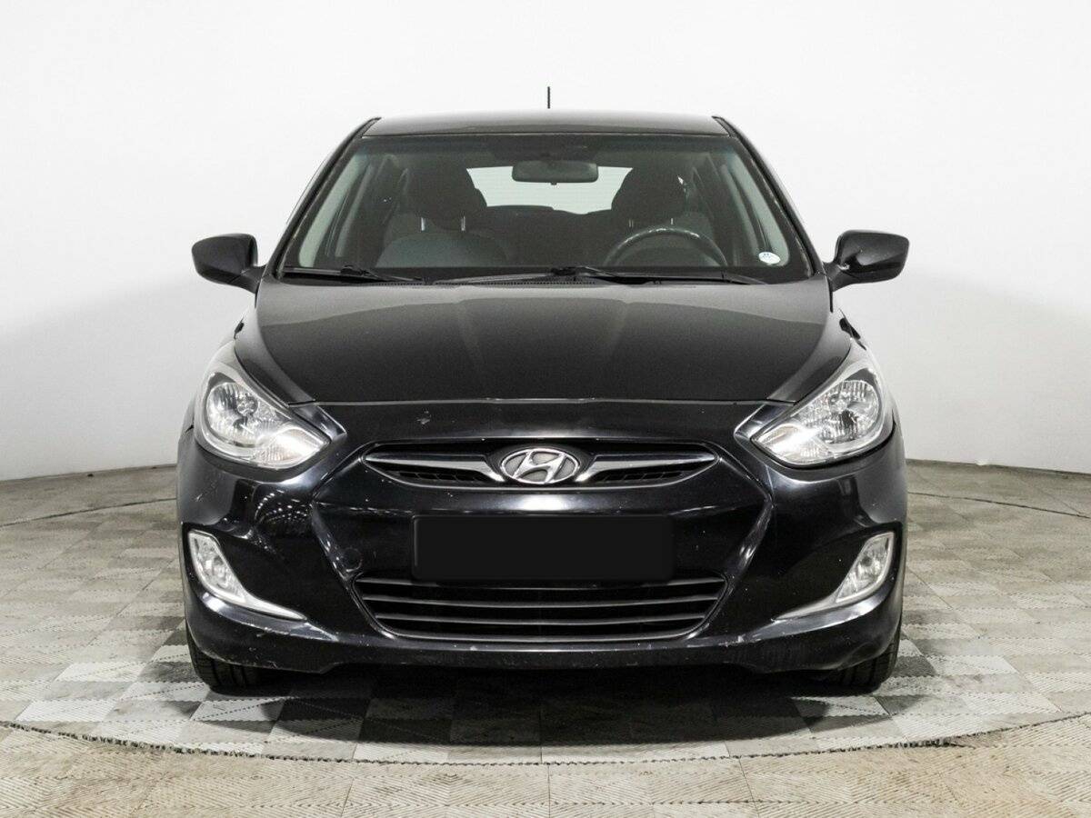 Hyundai Solaris с пробегом — 2011 год. Фото: #1