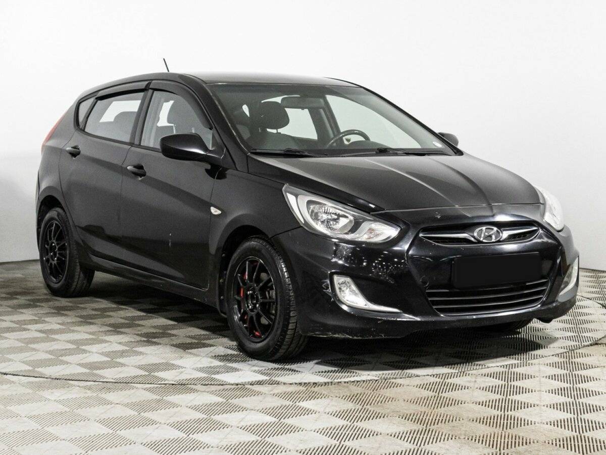 Hyundai Solaris с пробегом — 2011 год. Фото: #2