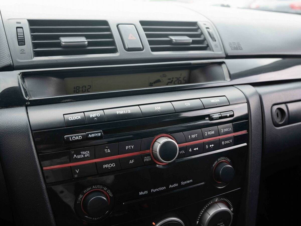 Mazda 3 с пробегом — 2008 год. Фото: #18