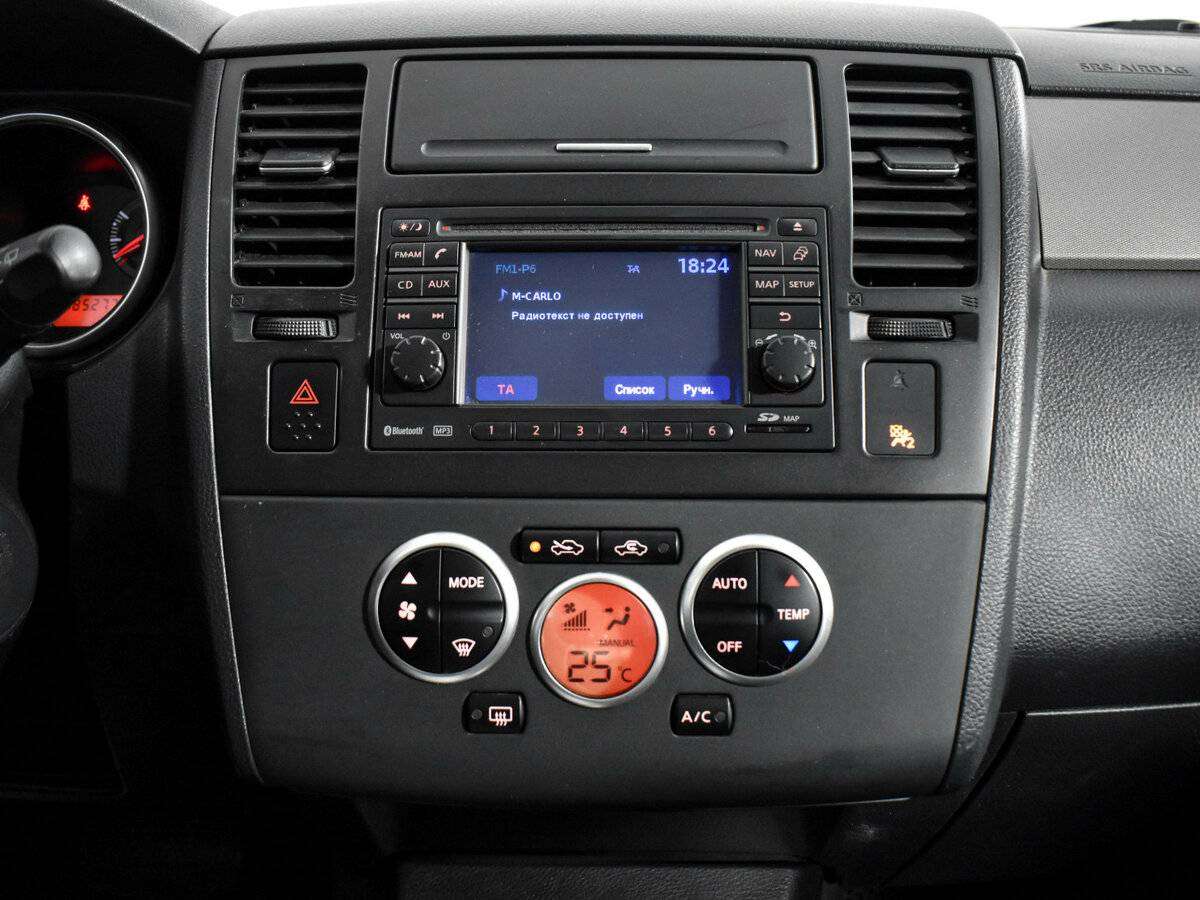 Nissan Tiida с пробегом — 2010 год. Фото: #13