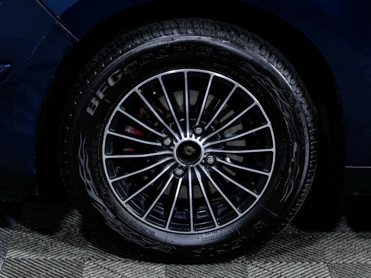 Nissan Tiida с пробегом — 2008 год. Фото: #14