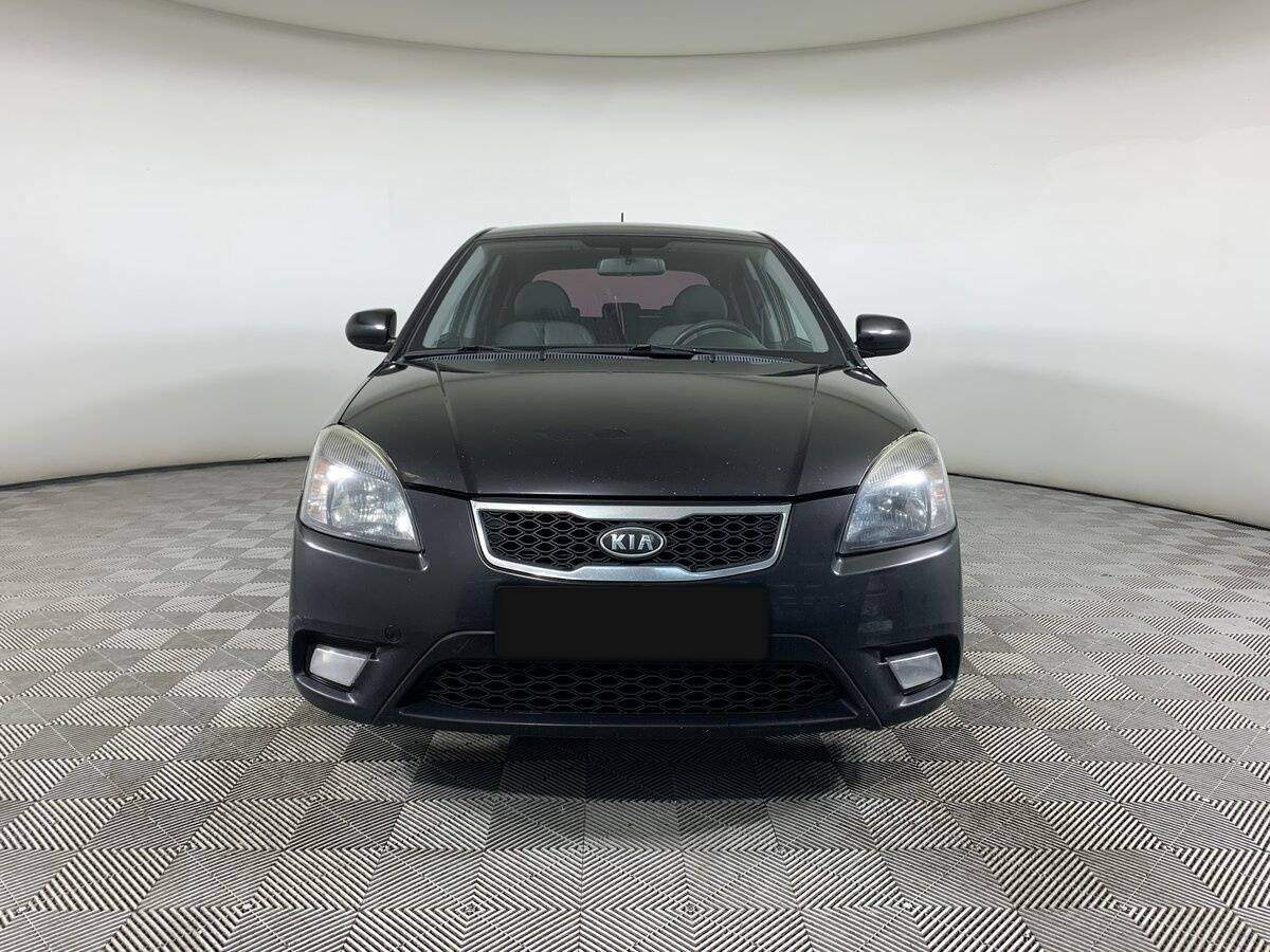Kia Rio с пробегом — 2010 год. Фото: #1