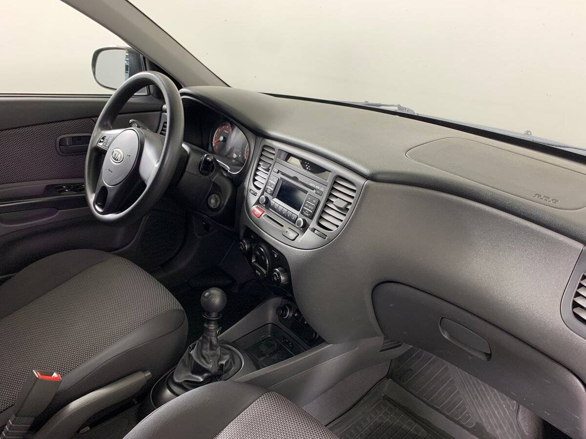 Kia Rio с пробегом — 2010 год. Фото: #12
