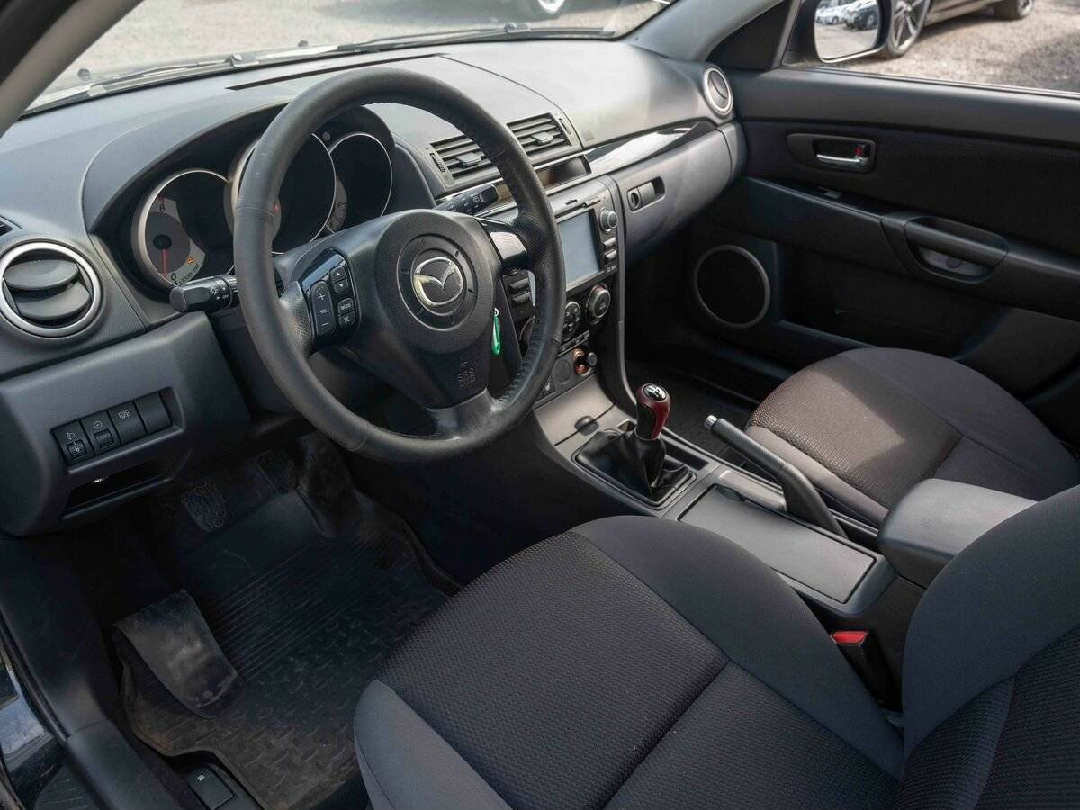 Mazda 3 с пробегом — 2008 год. Фото: #7