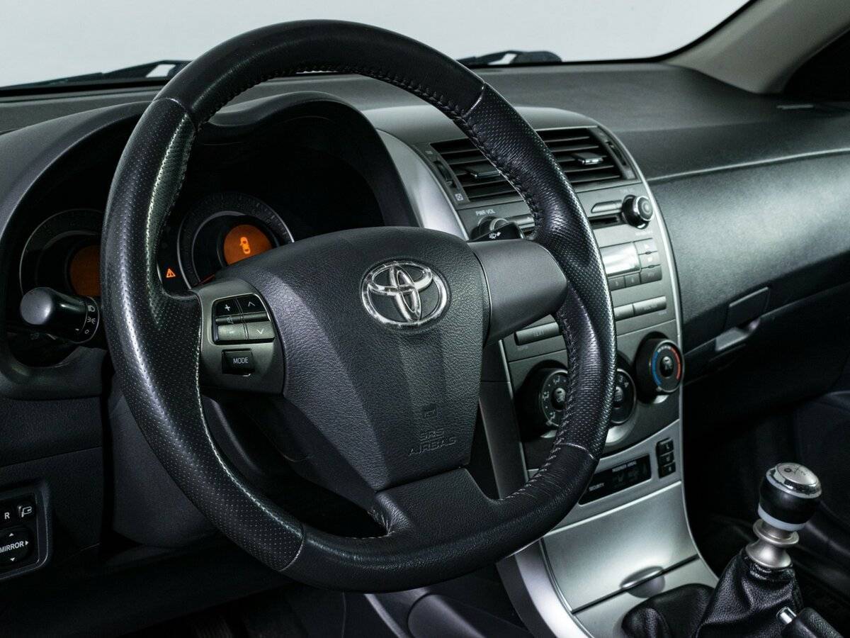 Toyota Corolla с пробегом — 2011 год. Фото: #11