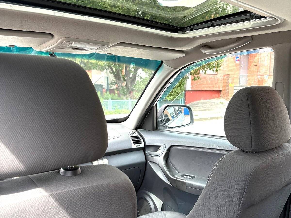 Chery Tiggo (T11) с пробегом — 2013 год. Фото: #8