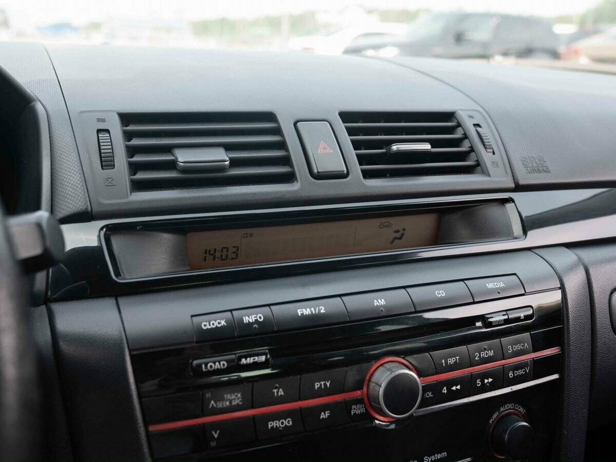 Mazda 3 с пробегом — 2008 год. Фото: #18