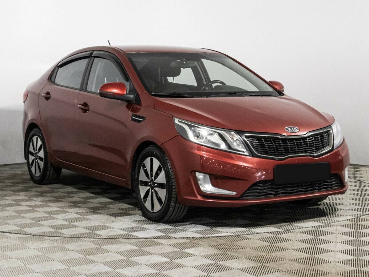 Kia Rio с пробегом — 2011 год. Фото: #2