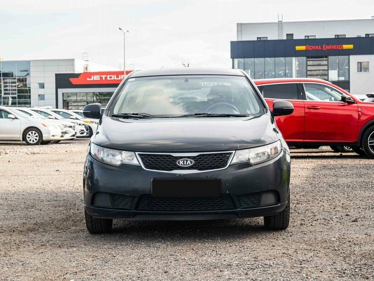 Kia Cerato с пробегом — 2012 год. Фото: #1
