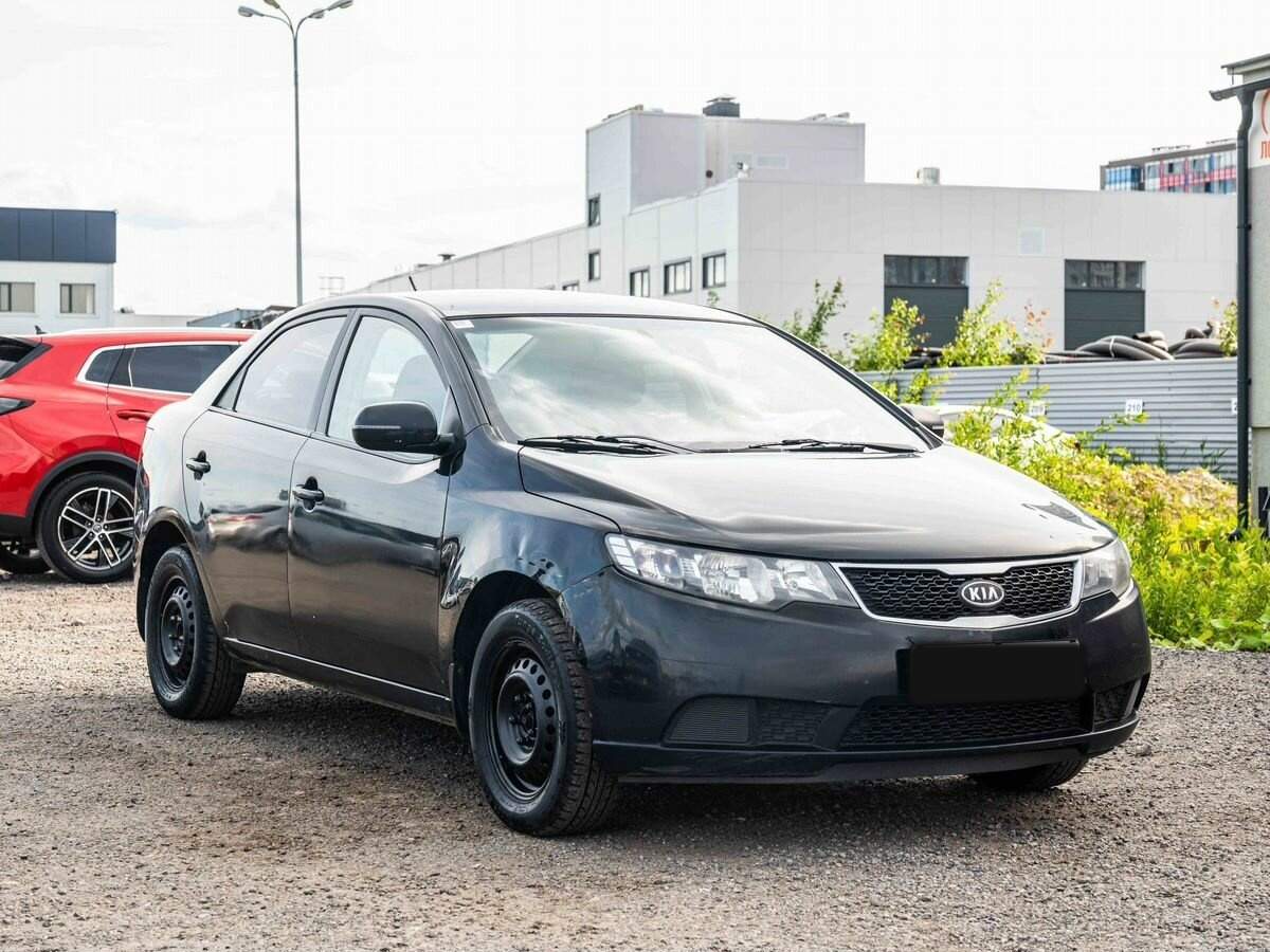 Kia Cerato с пробегом — 2012 год. Фото: #2
