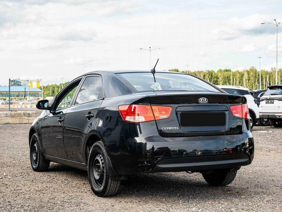 Kia Cerato с пробегом — 2012 год. Фото: #3