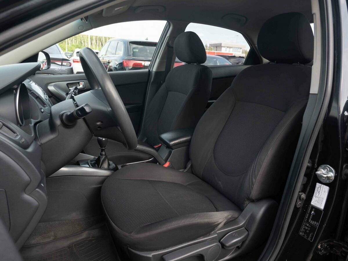 Kia Cerato с пробегом — 2012 год. Фото: #7