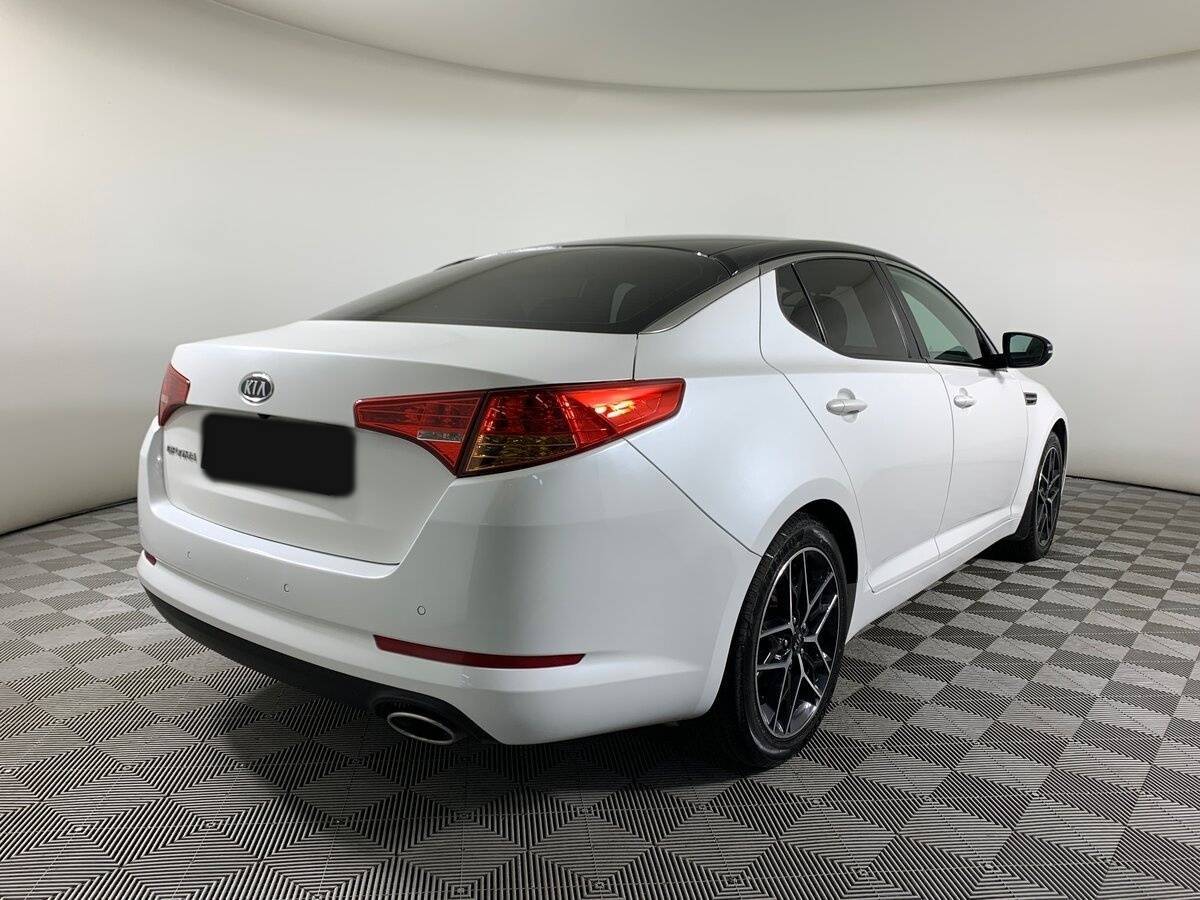 Kia Optima с пробегом — 2011 год. Фото: #4