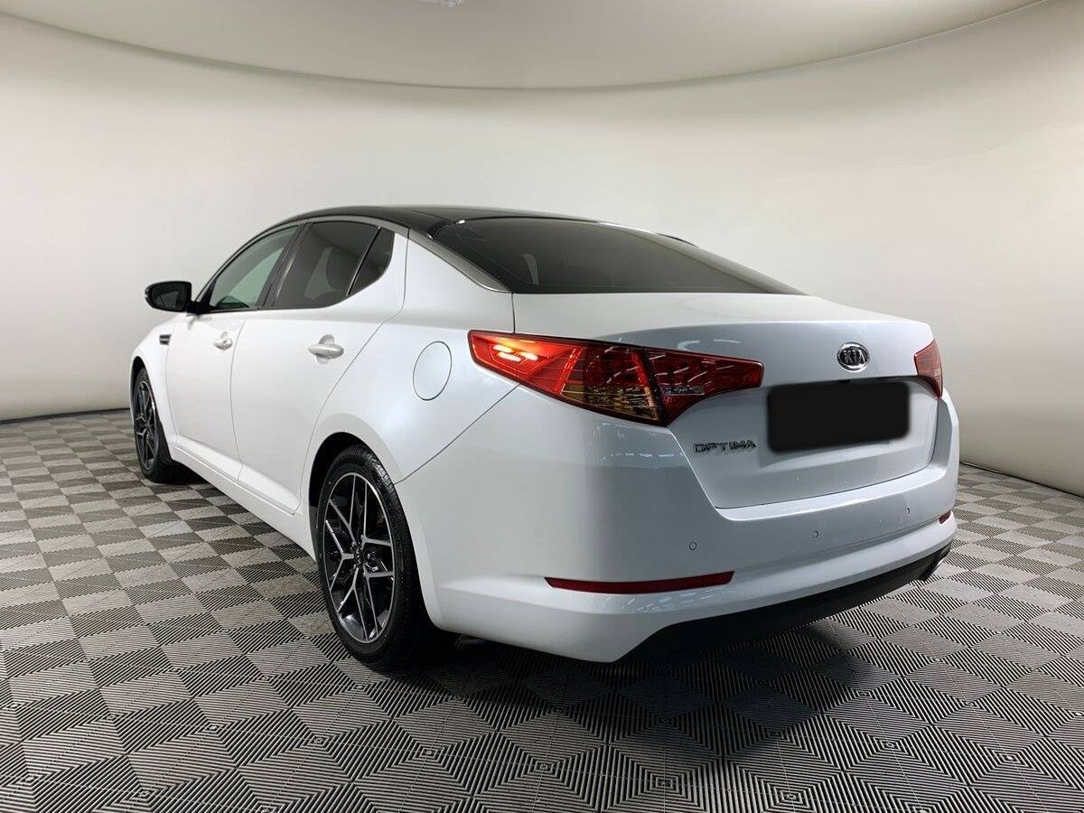 Kia Optima с пробегом — 2011 год. Фото: #6