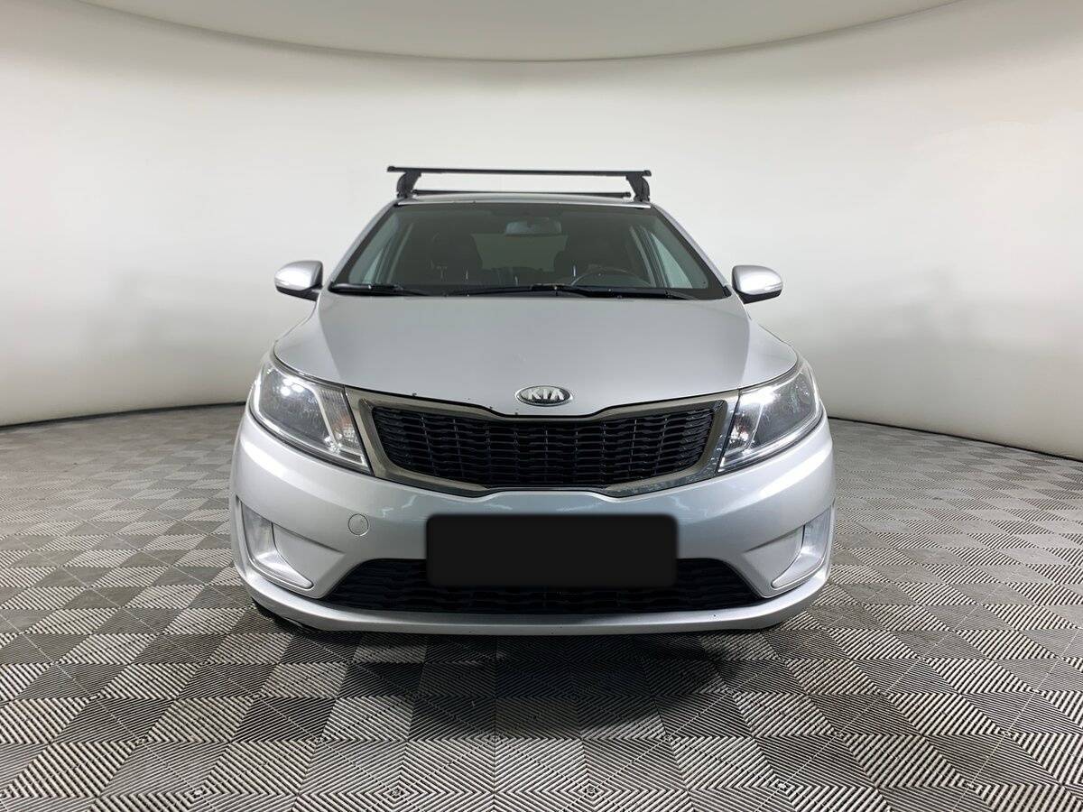 Kia Rio с пробегом — 2013 год. Фото: #1