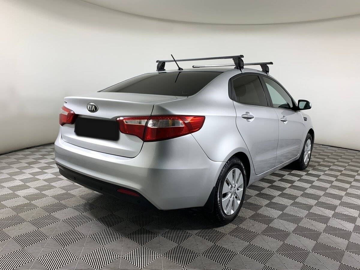 Kia Rio с пробегом — 2013 год. Фото: #4