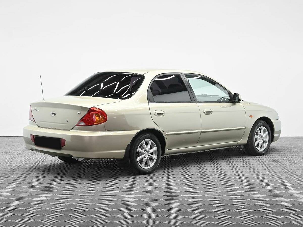 Kia Spectra с пробегом — 2009 год. Фото: #1