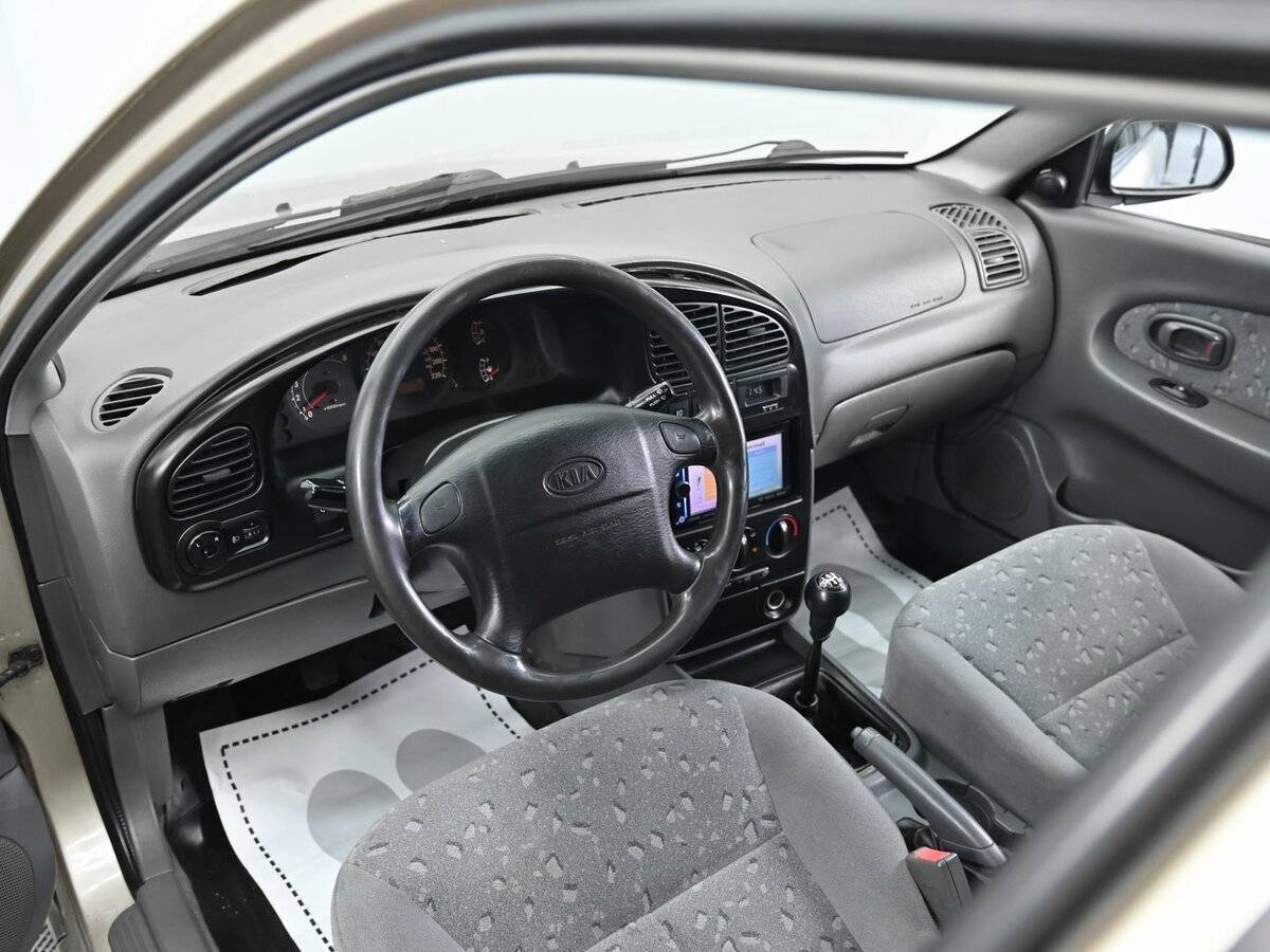 Kia Spectra с пробегом — 2009 год. Фото: #8