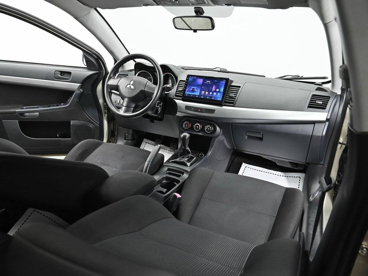 Mitsubishi Lancer с пробегом — 2010 год. Фото: #10