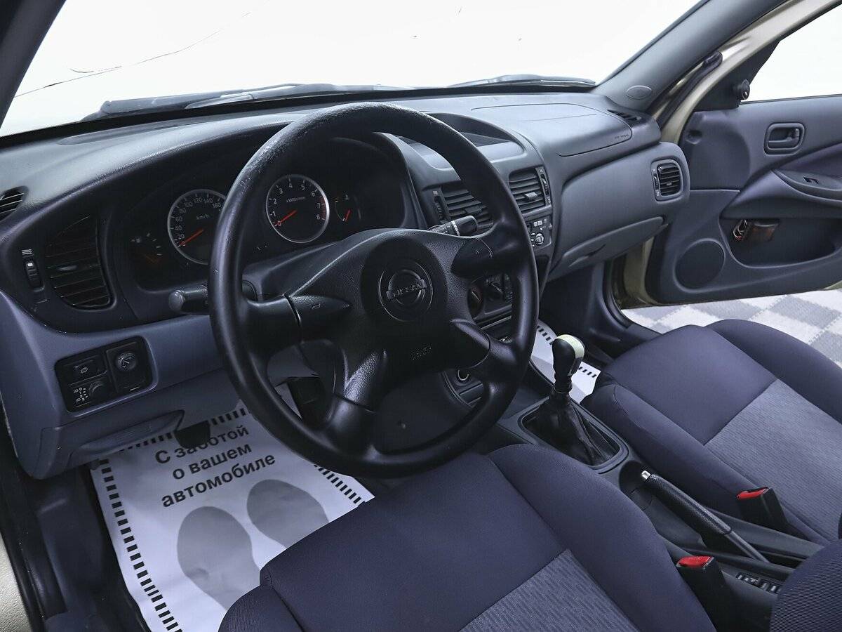 Nissan Almera с пробегом — 2004 год. Фото: #7