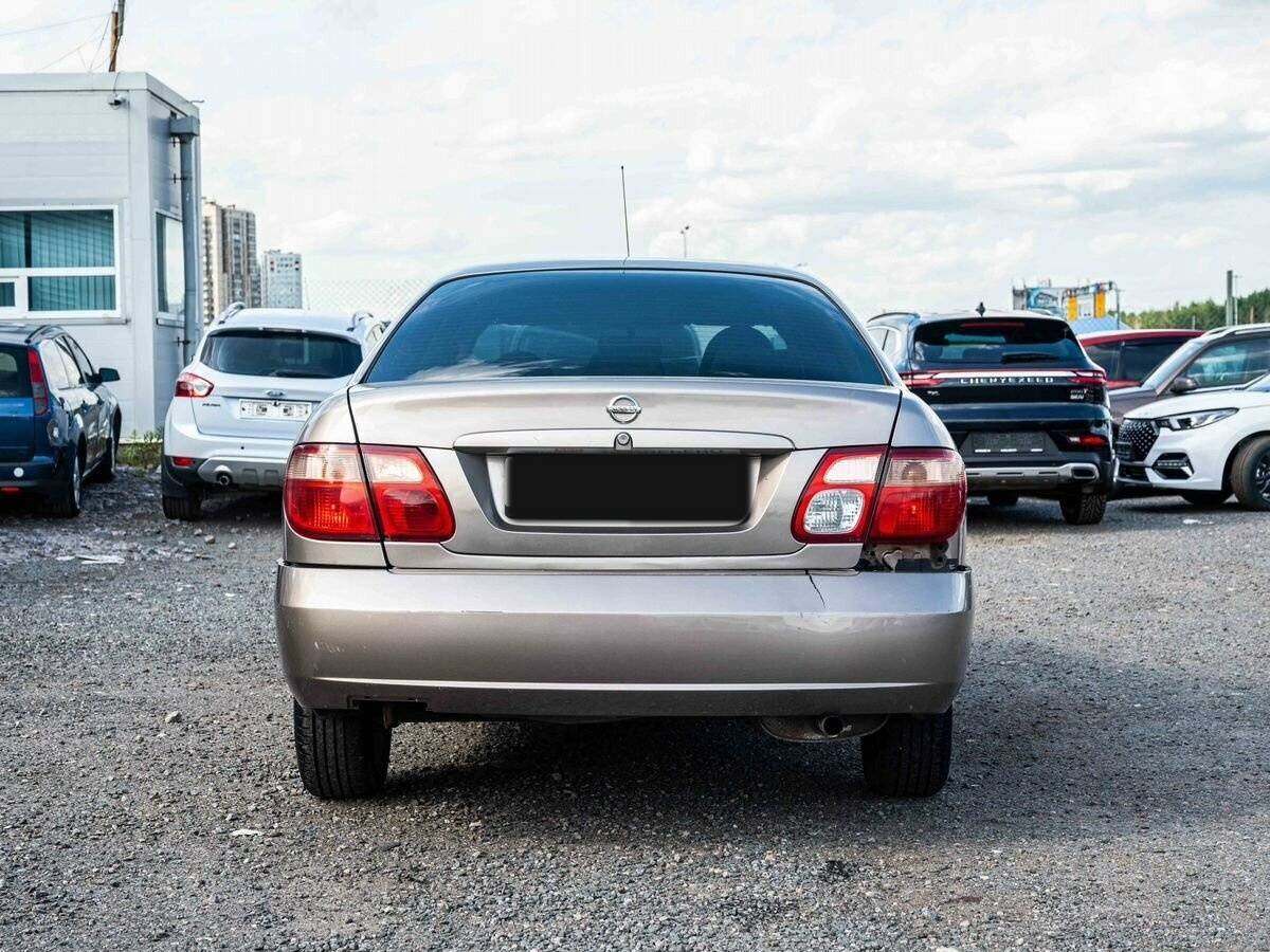Nissan Almera с пробегом — 2004 год. Фото: #4