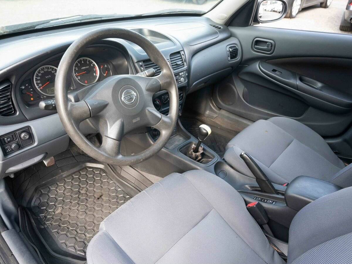Nissan Almera с пробегом — 2004 год. Фото: #6