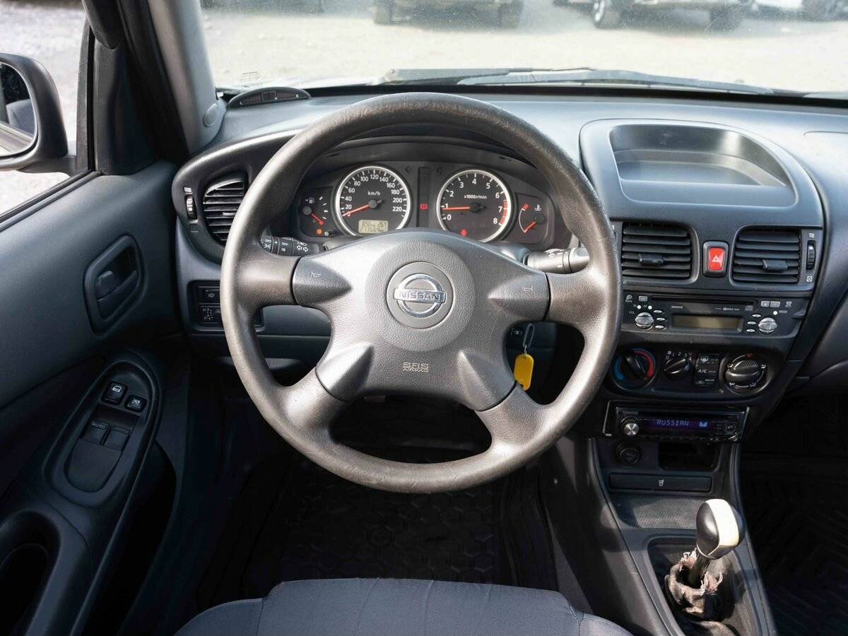 Nissan Almera с пробегом — 2004 год. Фото: #13
