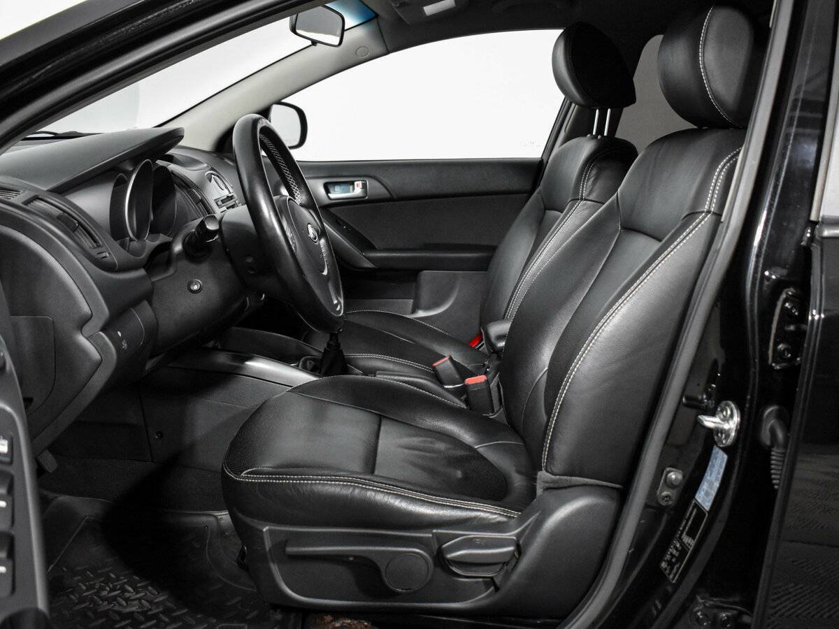 Kia Cerato с пробегом — 2011 год. Фото: #8