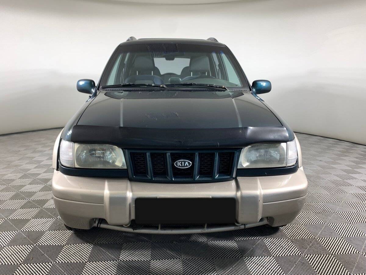 Kia Sportage с пробегом — 2003 год. Фото: #1