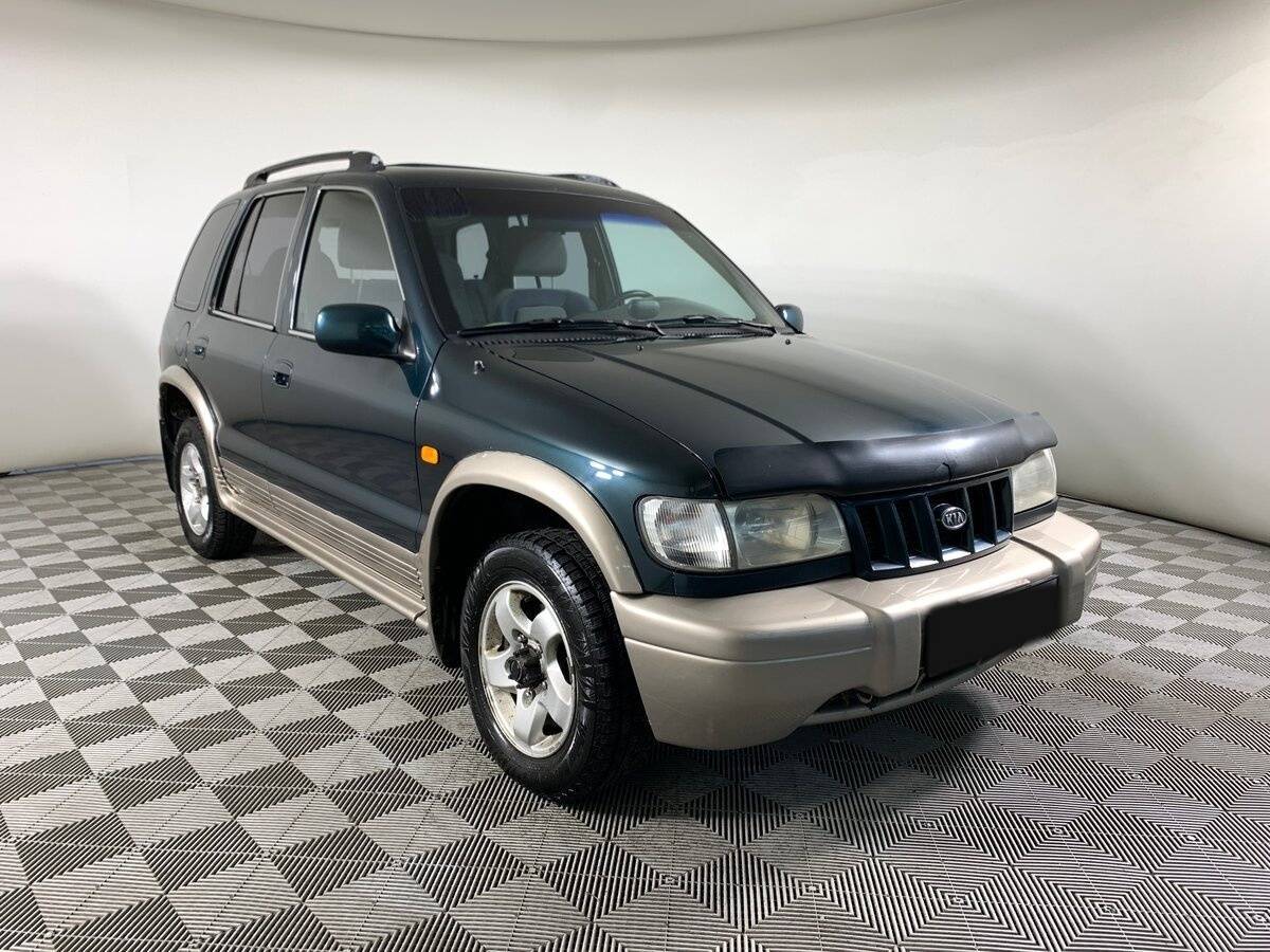 Kia Sportage с пробегом — 2003 год. Фото: #2