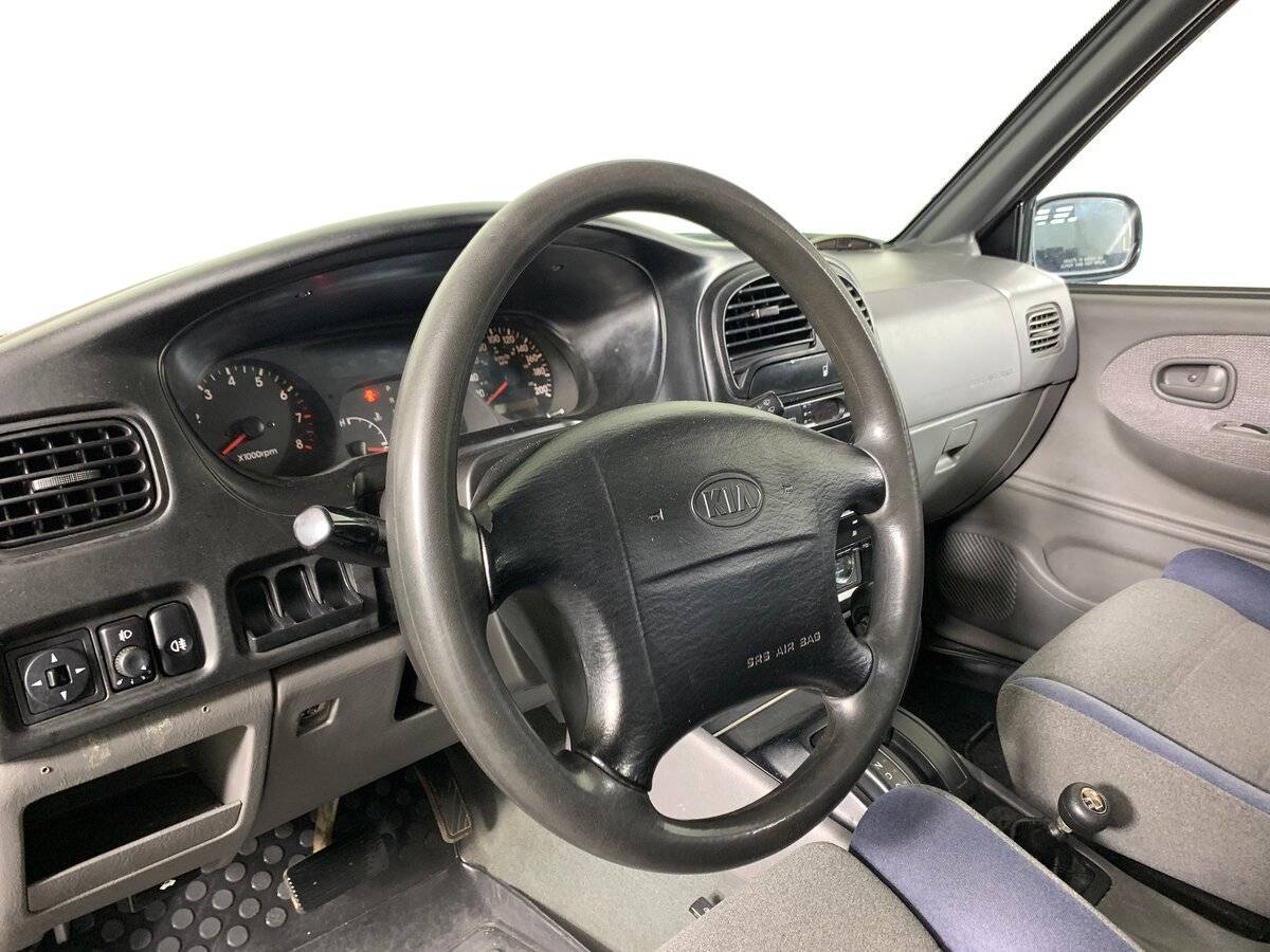 Kia Sportage с пробегом — 2003 год. Фото: #10