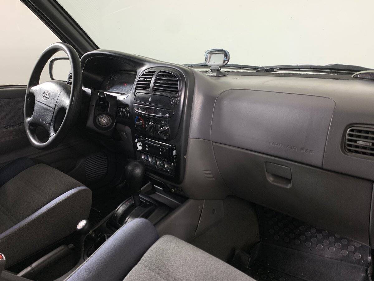 Kia Sportage с пробегом — 2003 год. Фото: #12