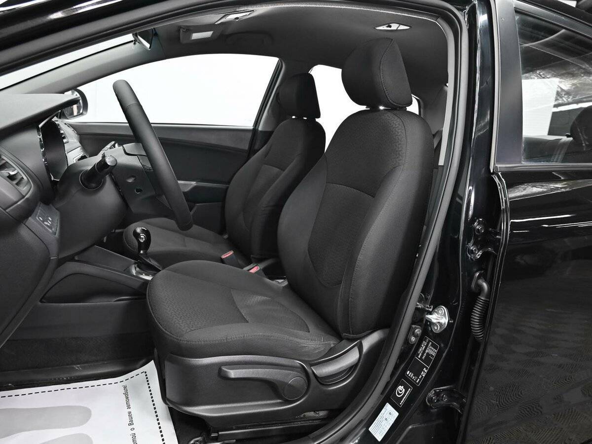 Kia Rio с пробегом — 2014 год. Фото: #4