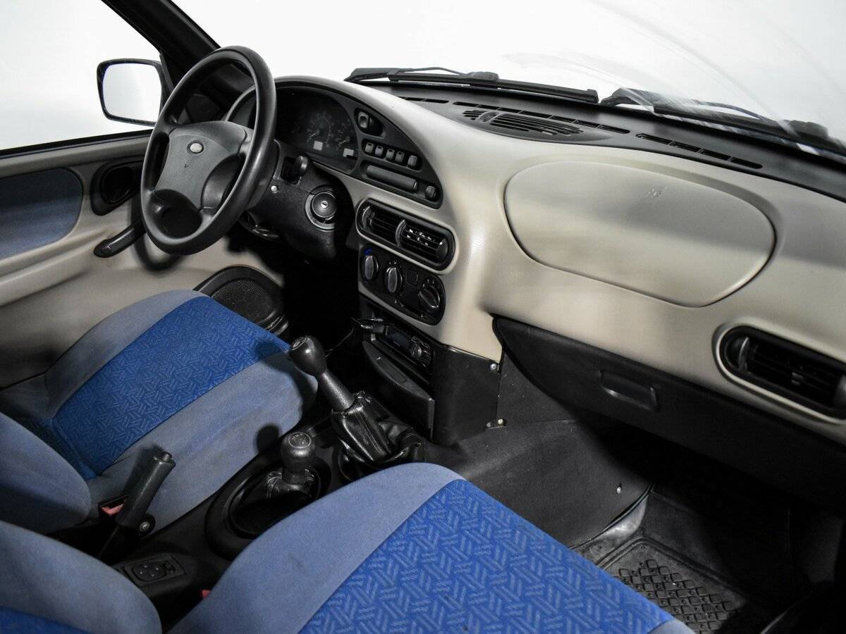 Chevrolet Niva с пробегом — 2005 год. Фото: #12