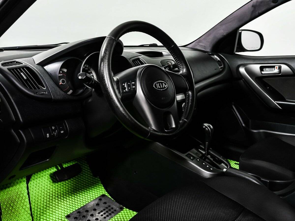 Kia Cerato с пробегом — 2010 год. Фото: #11