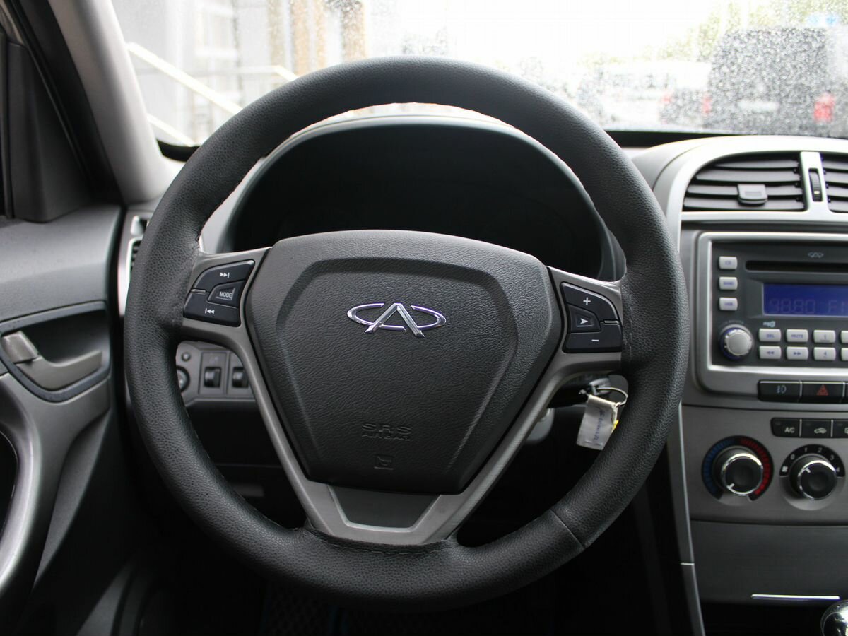 Chery Tiggo (T11) с пробегом — 2015 год. Фото: #9