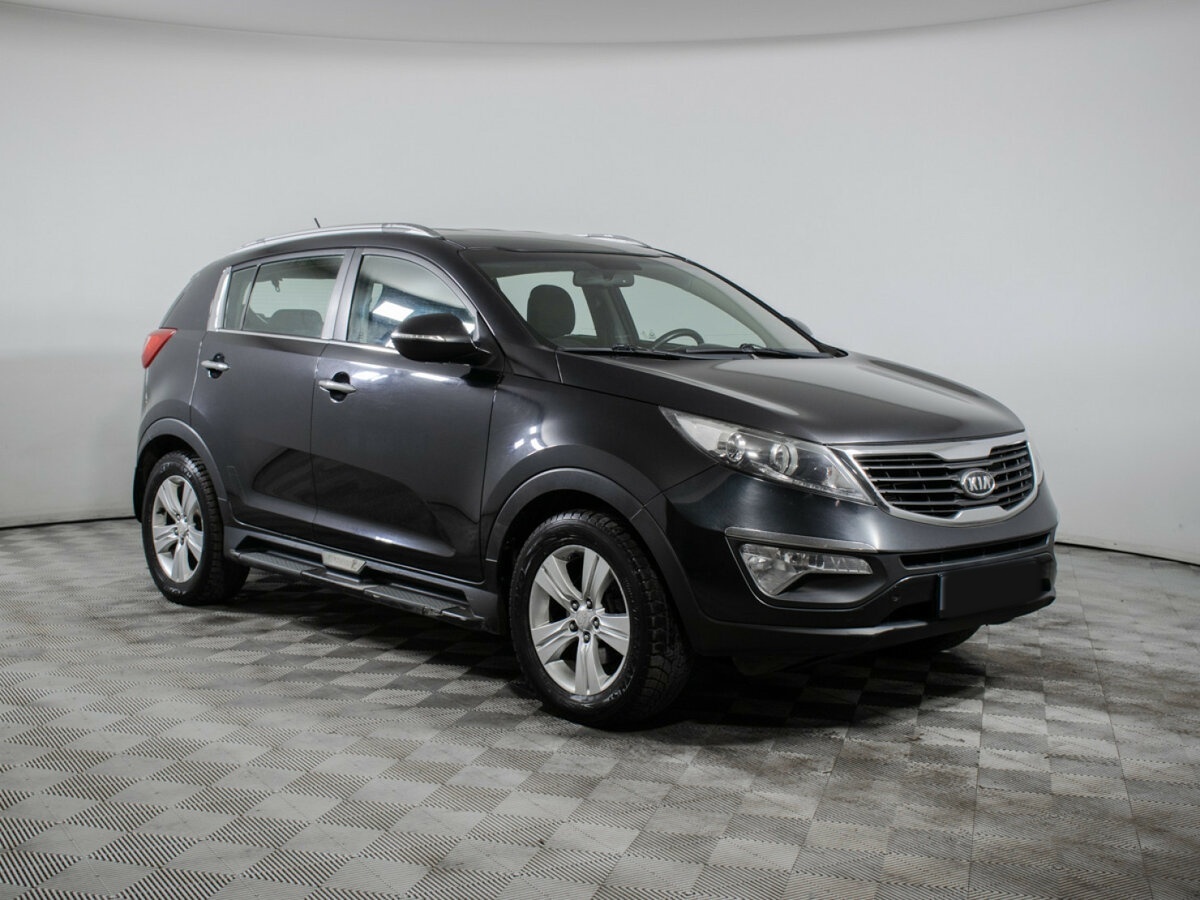 Kia Sportage с пробегом — 2011 год. Фото: #2